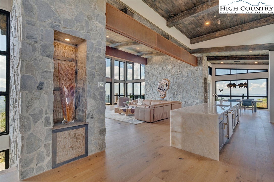 294 Silver Eagle Trail Banner Elk, NC 28604 - Photo 7 of 50 a living room with furniture and a fireplace