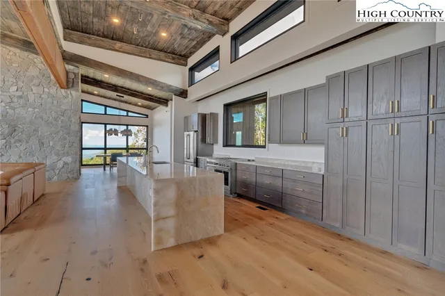 a lobby with furniture and a wooden floor