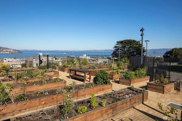 a view of swimming pool with outdoor seating and yard