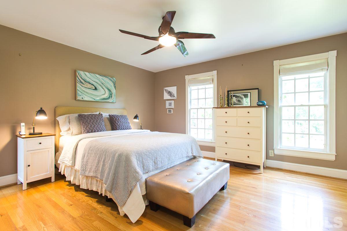 1715 Six Gables Road Durham, NC 27712 - Photo 13 of 25 Wood floors upstairs, too? Wow, this builder was WAY ahead of his time. The master bedroom is generously spaced for plenty of furniture and 2 closets.