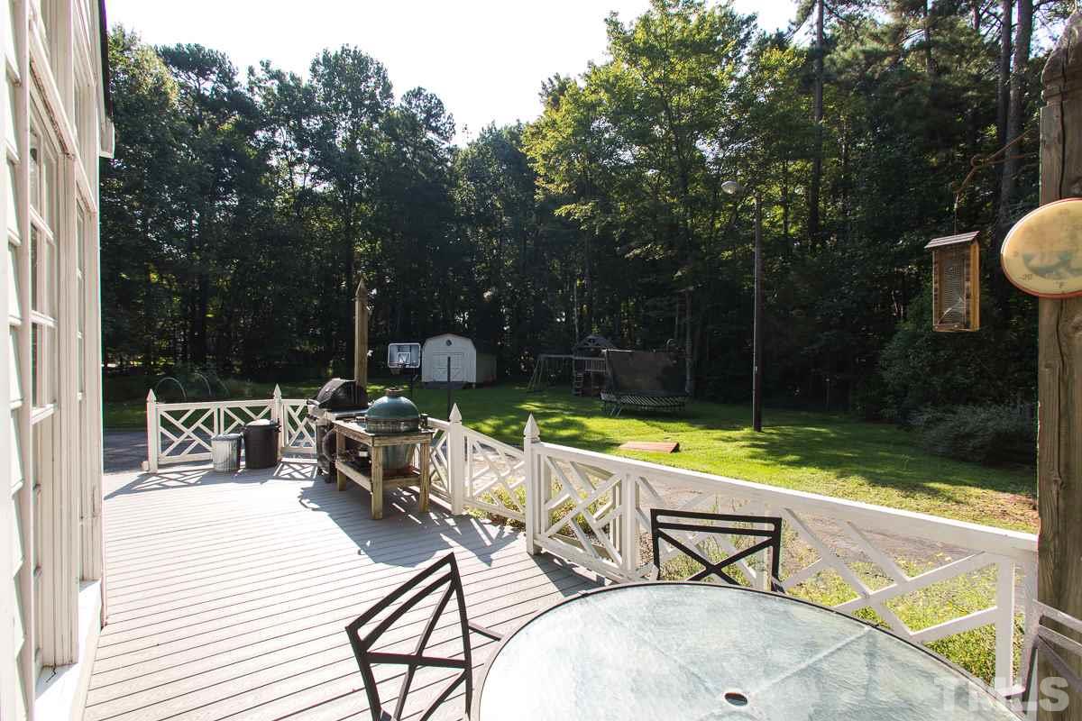 1715 Six Gables Road Durham, NC 27712 - Photo 23 of 25 This property is nearly an acre (0.90) so there's lots of space in front and back to play and relax. The play structure is included with the house as are the two storage sheds. One even has a chicken coop!