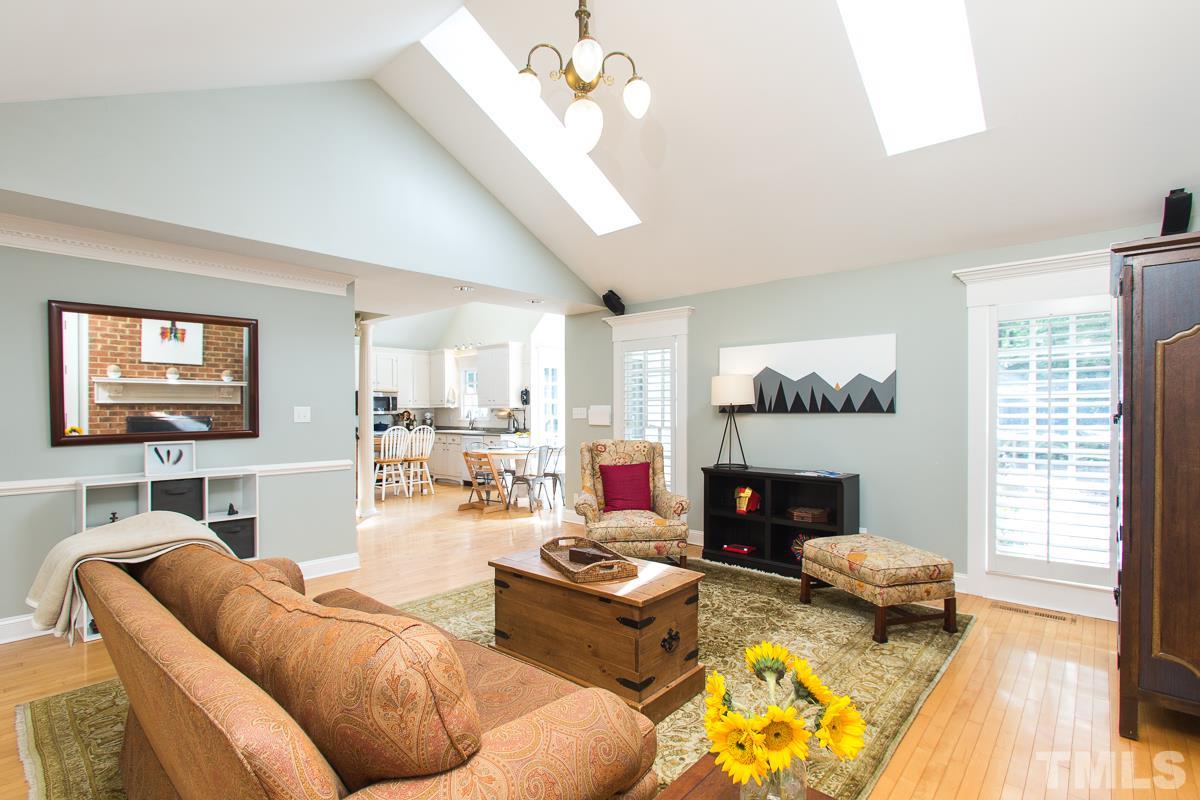 1715 Six Gables Road Durham, NC 27712 - Photo 25 of 25 You will love how open this floor plan is throughout the lower level. One room easily flows into the next. From the kitchen, it's easy to be a part of the fun happening in the living room.
