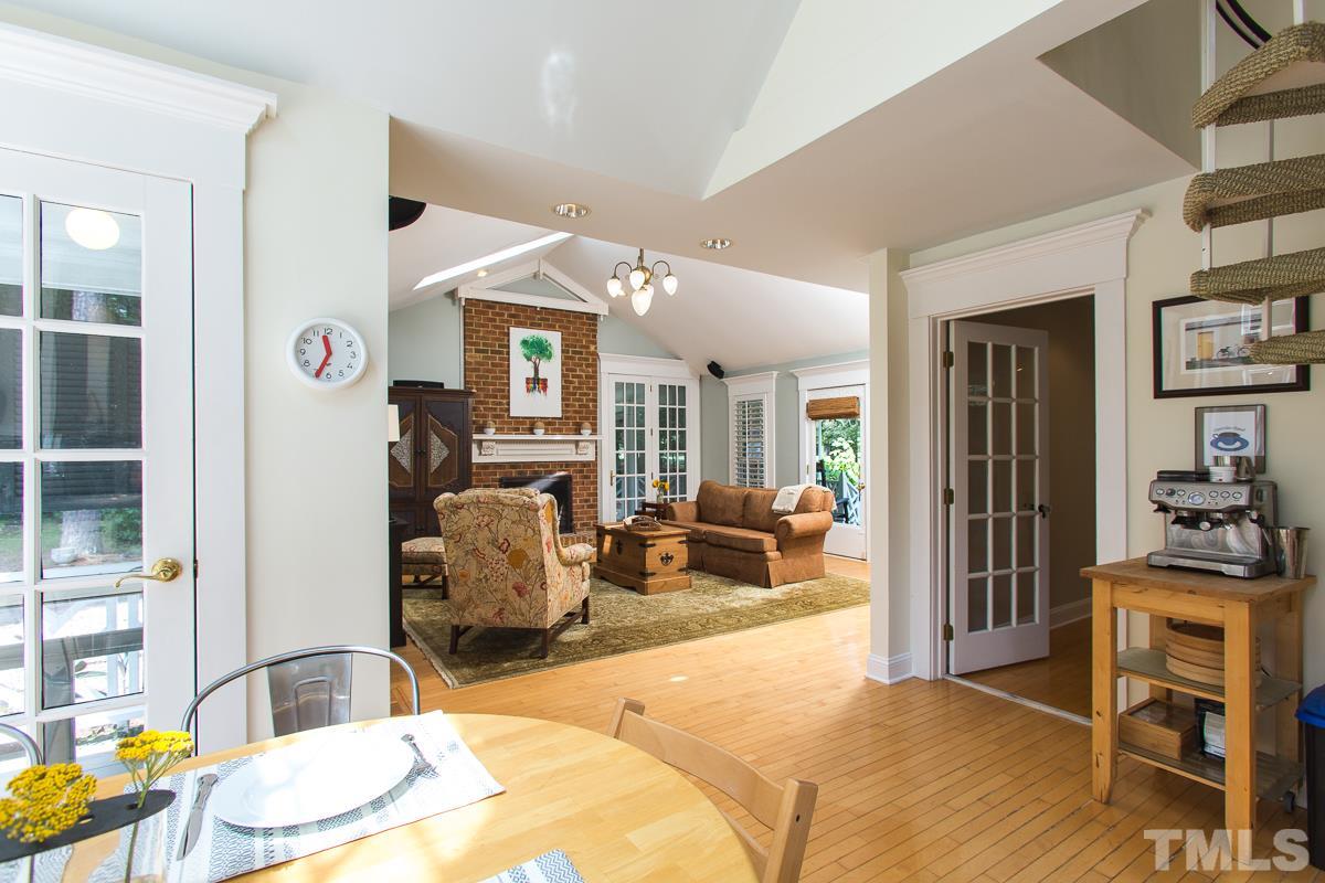1715 Six Gables Road Durham, NC 27712 - Photo 6 of 25 The sunny breakfast nook enjoys a great view of the back yard and deck. There is a door out to the deck which makes dining outside a breeze. There's even space inside for a separate coffee bar!