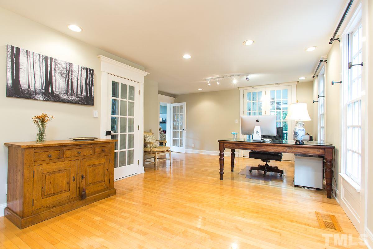1715 Six Gables Road Durham, NC 27712 - Photo 9 of 25 The dining room is beautifully accented with maple floors, custom moulding and a door that leads out to the covered porch making it easy to retire outside after dinner out for a whiskey or a cup of hot cocoa. Don't need a dining room- use it for an office