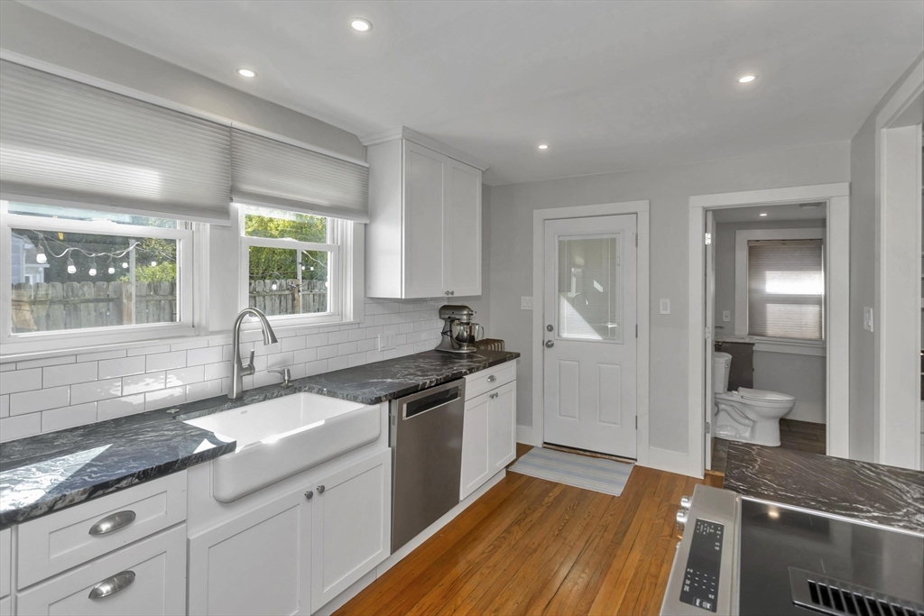 274 Abbott Street Springfield, MA 01118 - Photo 11 of 42 a kitchen with a sink stove and cabinets