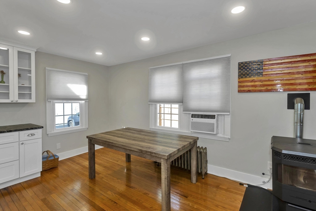 274 Abbott Street Springfield, MA 01118 - Photo 18 of 42 a kitchen with a wooden floor and next to a window