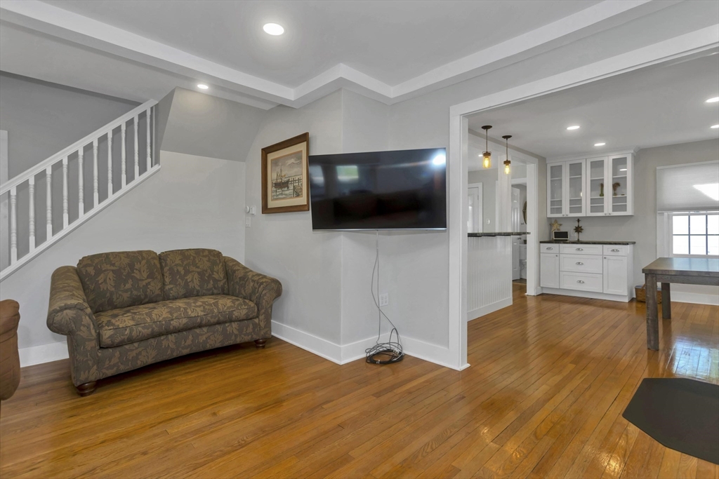 274 Abbott Street Springfield, MA 01118 - Photo 21 of 42 a living room with furniture and a flat screen tv