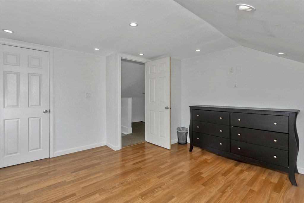 274 Abbott Street Springfield, MA 01118 - Photo 28 of 42 a room with a dresser and a mirror