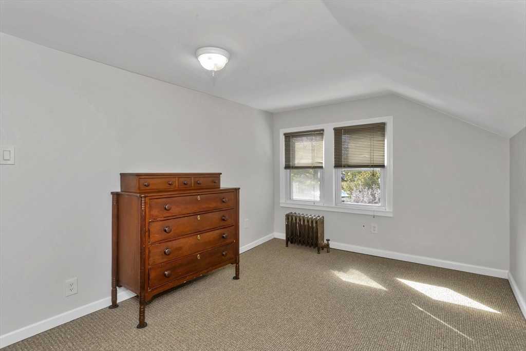 274 Abbott Street Springfield, MA 01118 - Photo 29 of 42 an empty room with windows and closet
