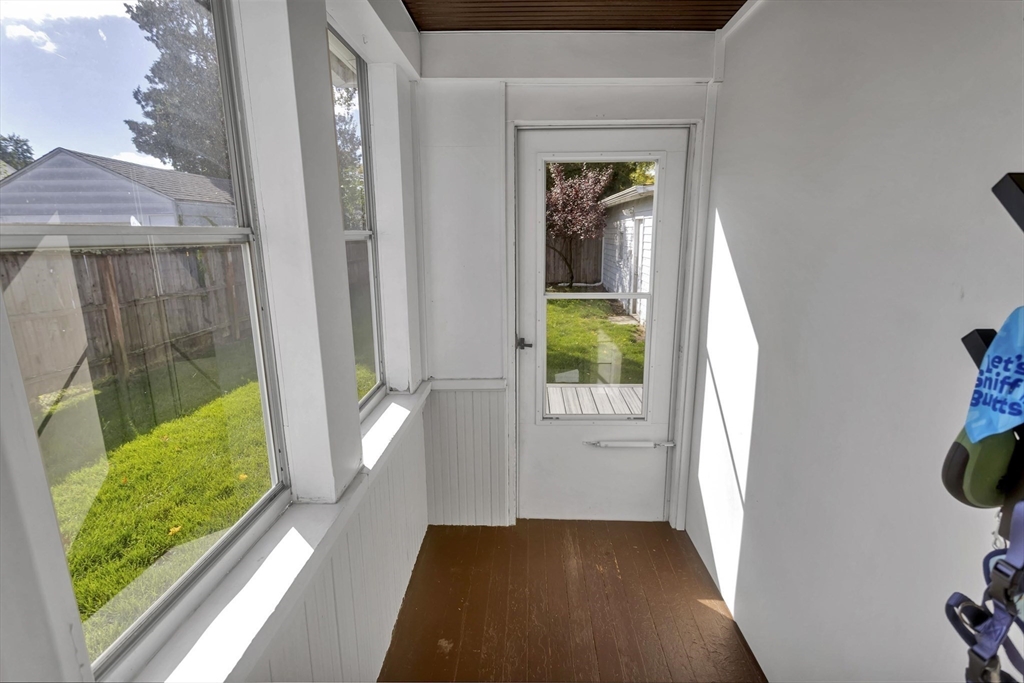 274 Abbott Street Springfield, MA 01118 - Photo 5 of 42 wooden floor in an empty room with a window