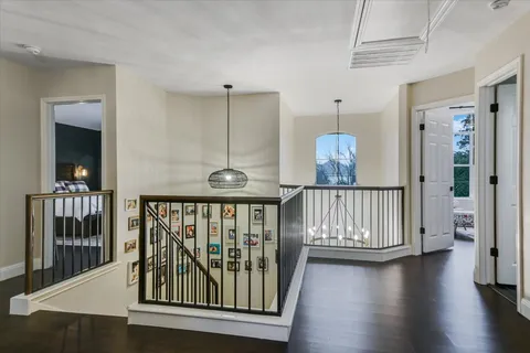 a view of entryway with wooden floor