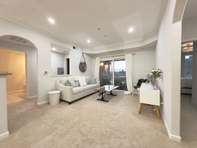 a living room with furniture and a couch