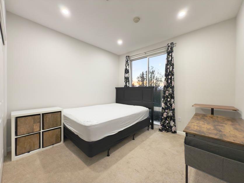 801 South Winchester Boulevard, Unit 4310 San Jose, CA 95128 - Photo 22 of 38 a room with a bed and a window