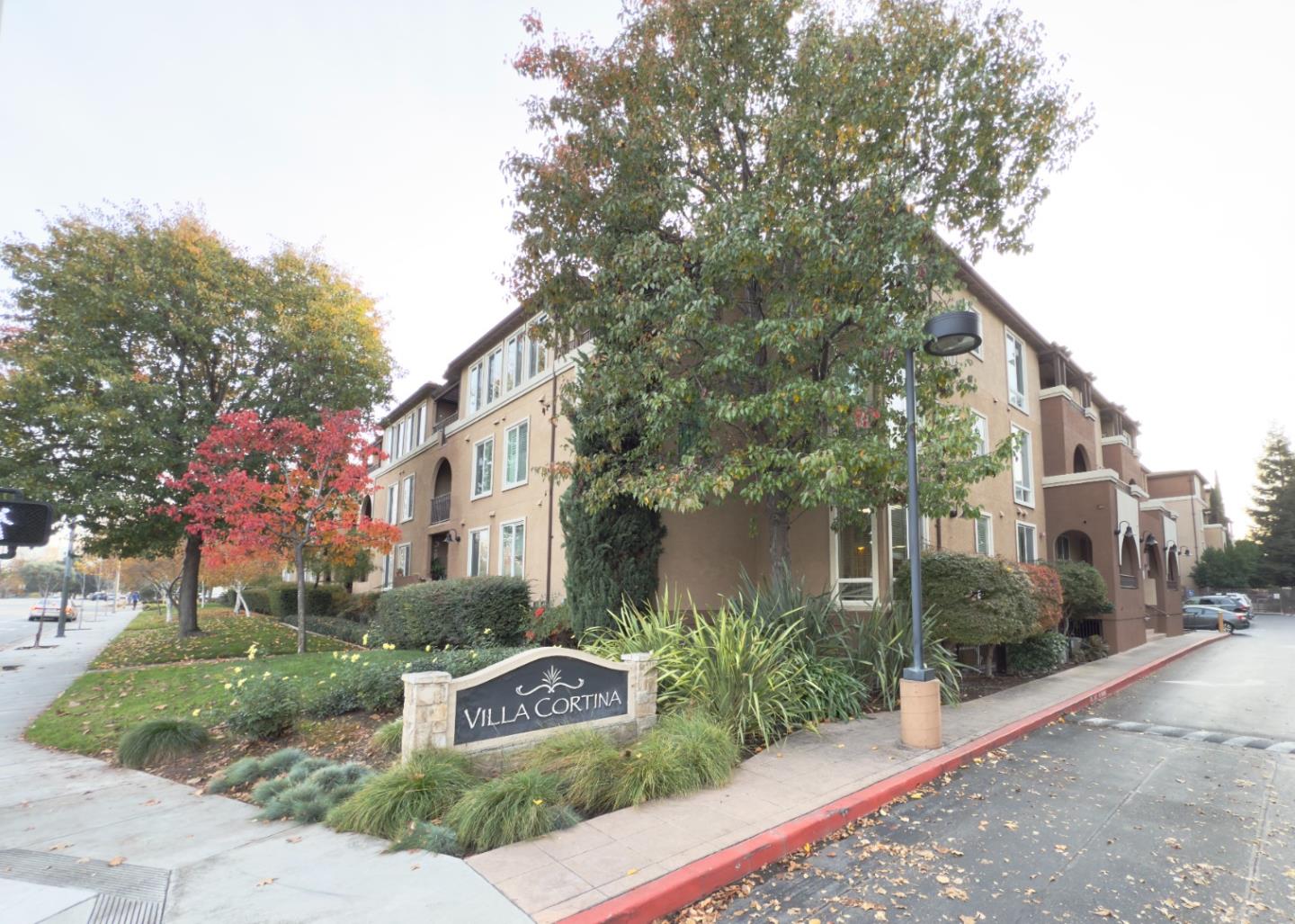 801 South Winchester Boulevard, Unit 4310 San Jose, CA 95128 - Photo 3 of 38 a front view of a house with garden and plants