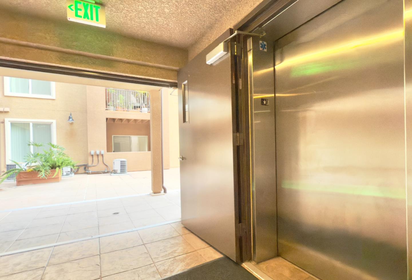801 South Winchester Boulevard, Unit 4310 San Jose, CA 95128 - Photo 4 of 38 a view of hallway with livingroom