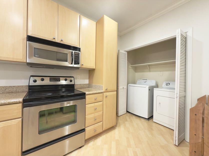 801 South Winchester Boulevard, Unit 4310 San Jose, CA 95128 - Photo 10 of 38 a kitchen with a stove and a microwave