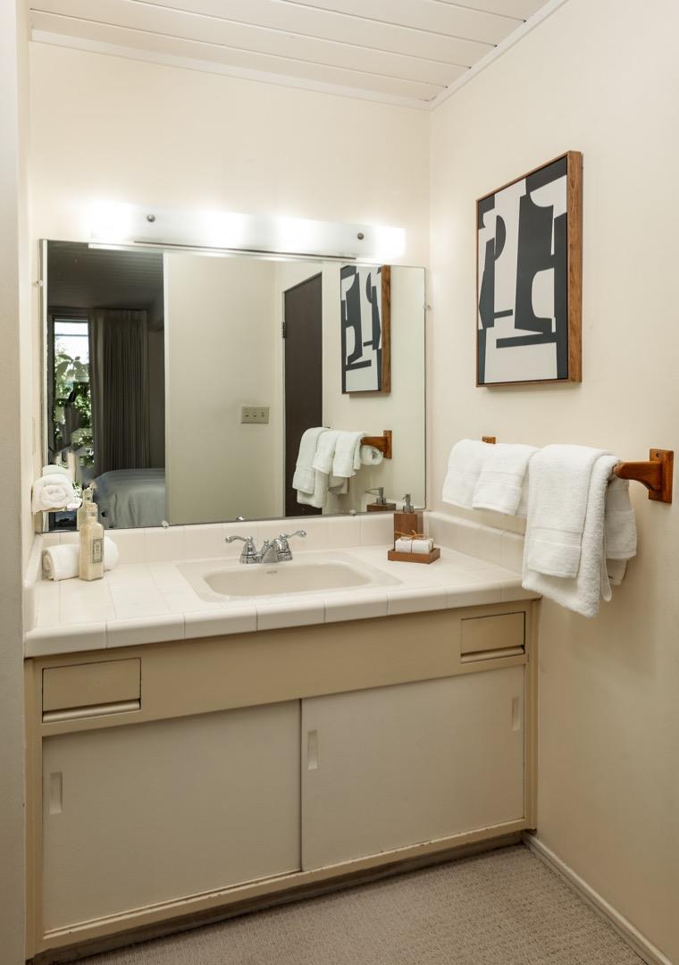 777 Devonshire Way Sunnyvale, CA 94087 - Photo 15 of 25 a bathroom with a sink and a mirror