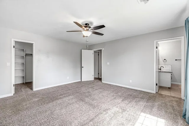 a view of an empty walk in closet