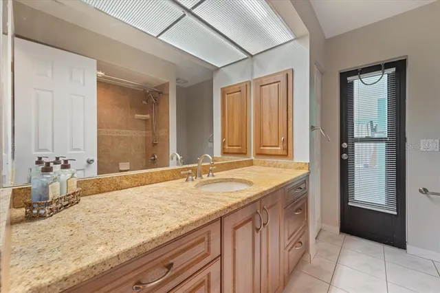 a bathroom with a tub and a shower