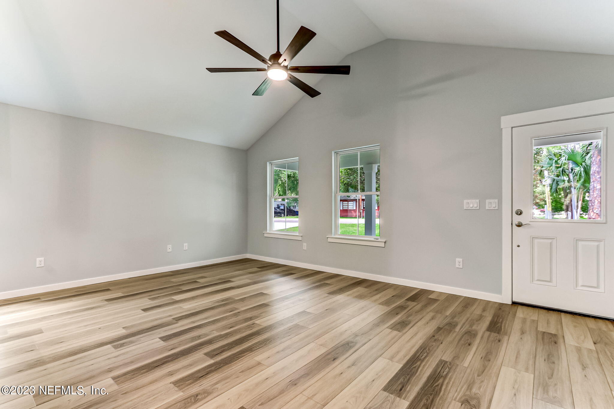 45115 South Mickler Street Callahan, FL 32011 - Photo 14 of 24 wooden floor in an empty room with a window