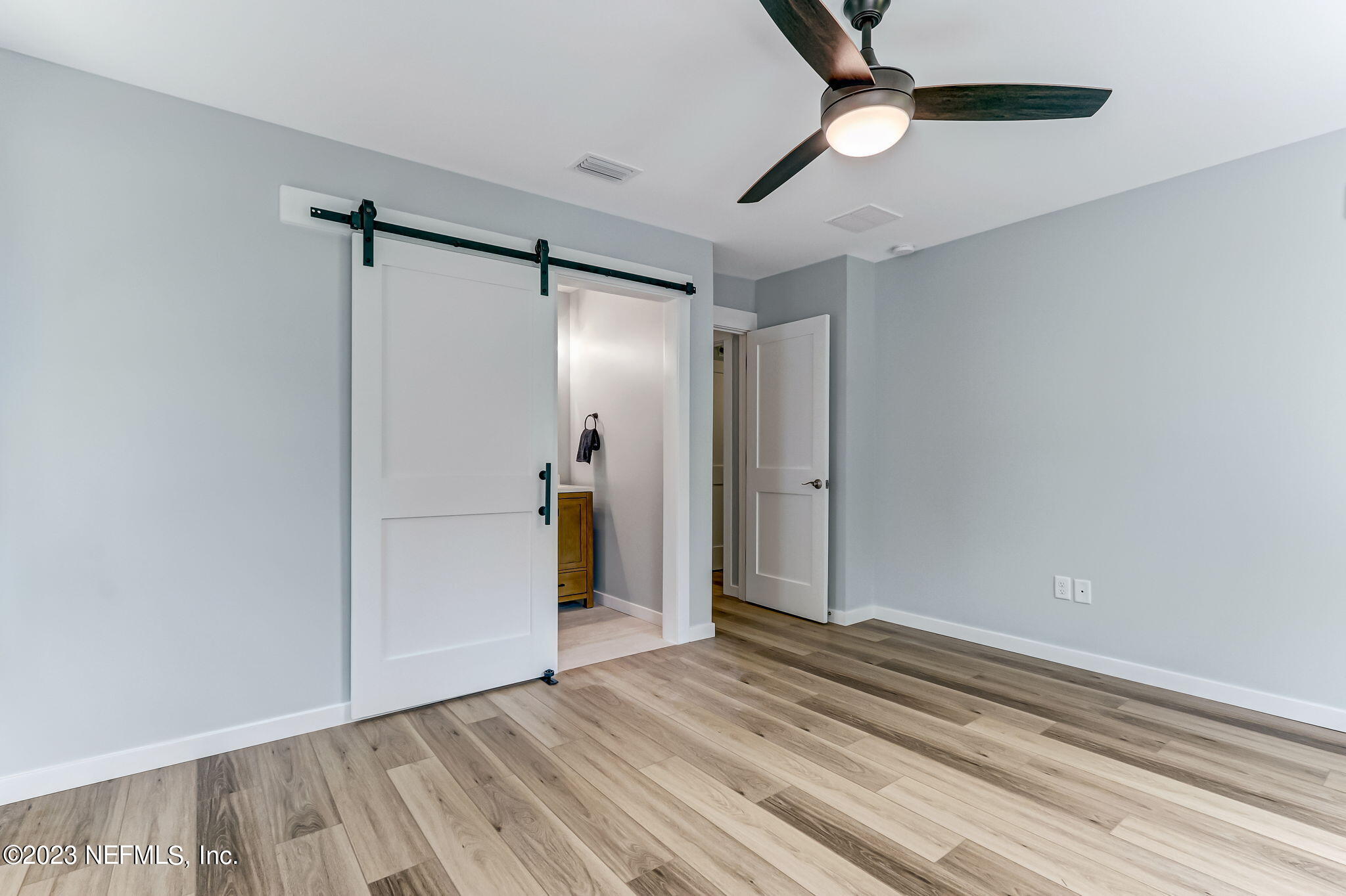 45115 South Mickler Street Callahan, FL 32011 - Photo 18 of 24 a view of empty room with wooden floor