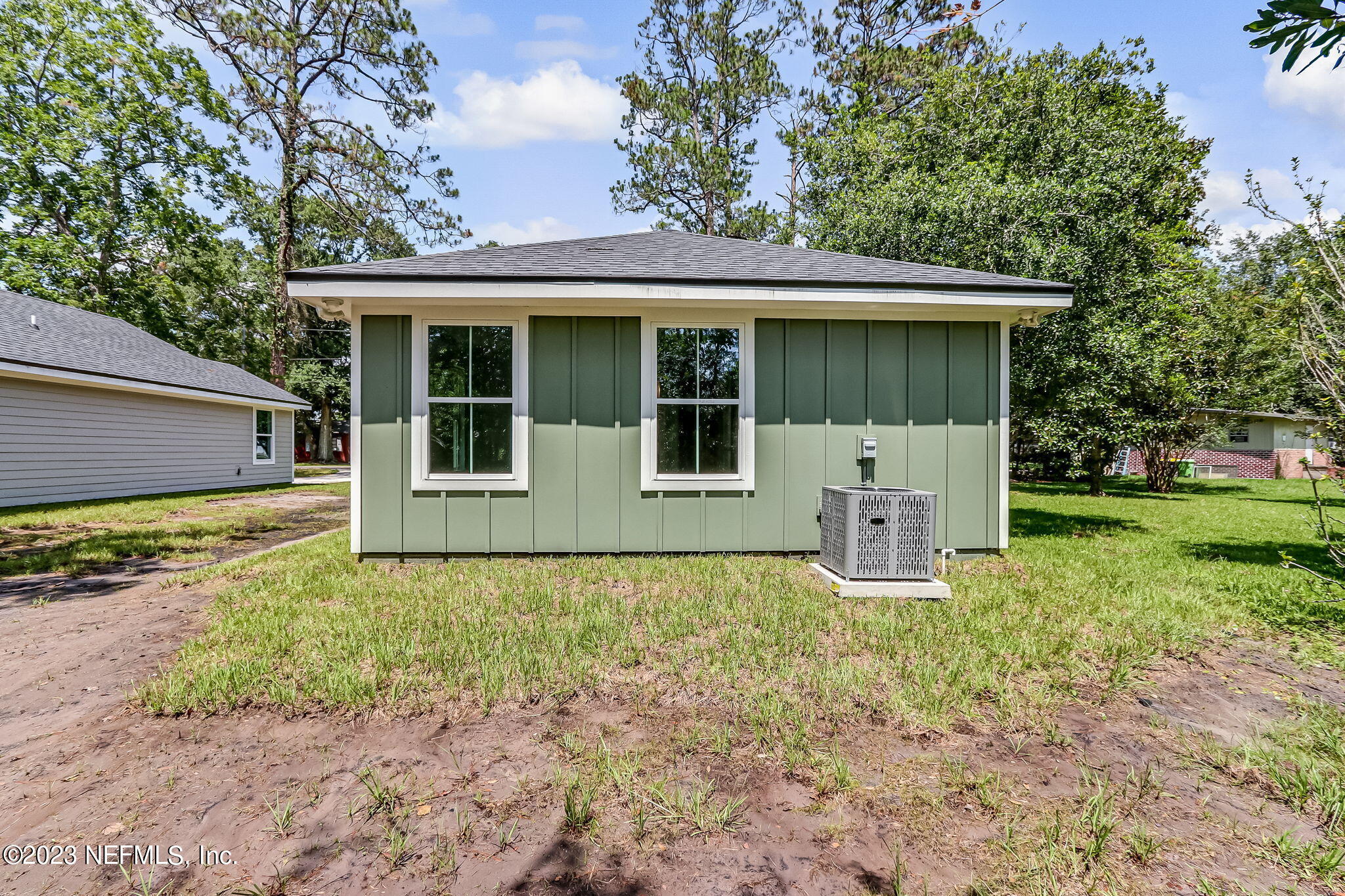 45115 South Mickler Street Callahan, FL 32011 - Photo 24 of 24 a house with trees in the background