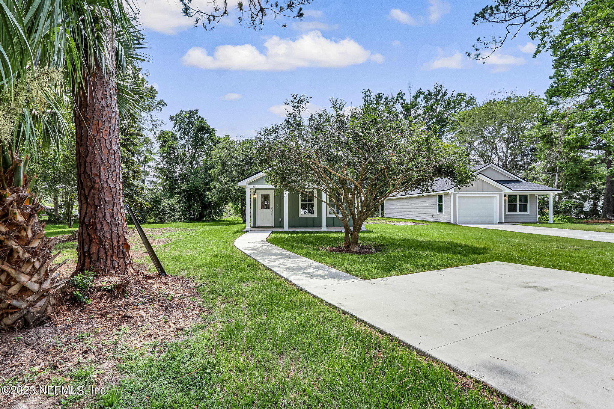 45115 South Mickler Street Callahan, FL 32011 - Photo 3 of 24 a view of a house with a yard
