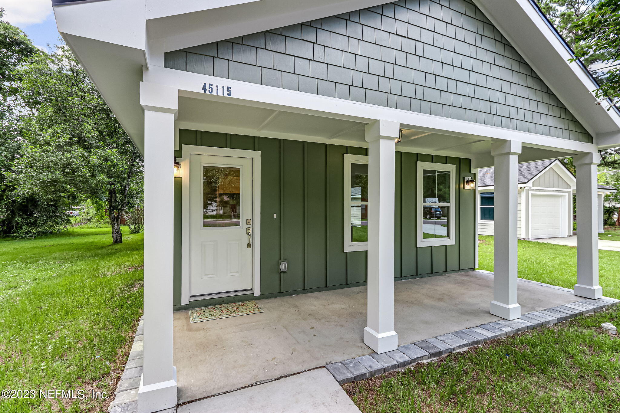 45115 South Mickler Street Callahan, FL 32011 - Photo 4 of 24 a view of a house with backyard