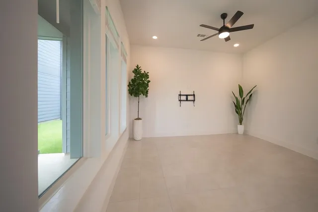 a view of an entryway with a potted plant