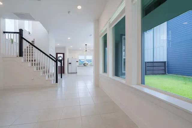 a view of staircase with lots of white walls