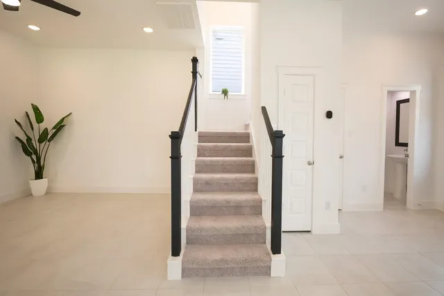 a view of entryway with stairs