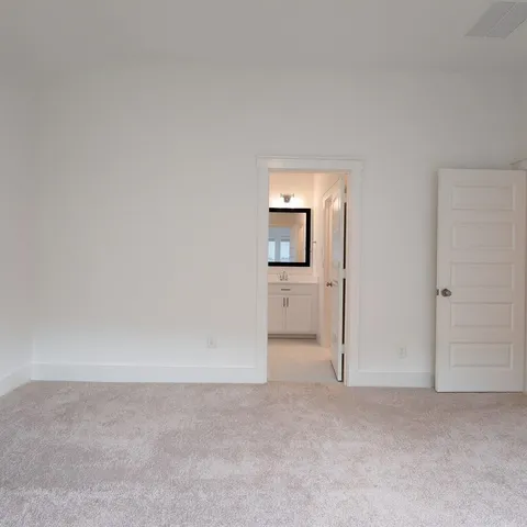 a view of a house with a garden