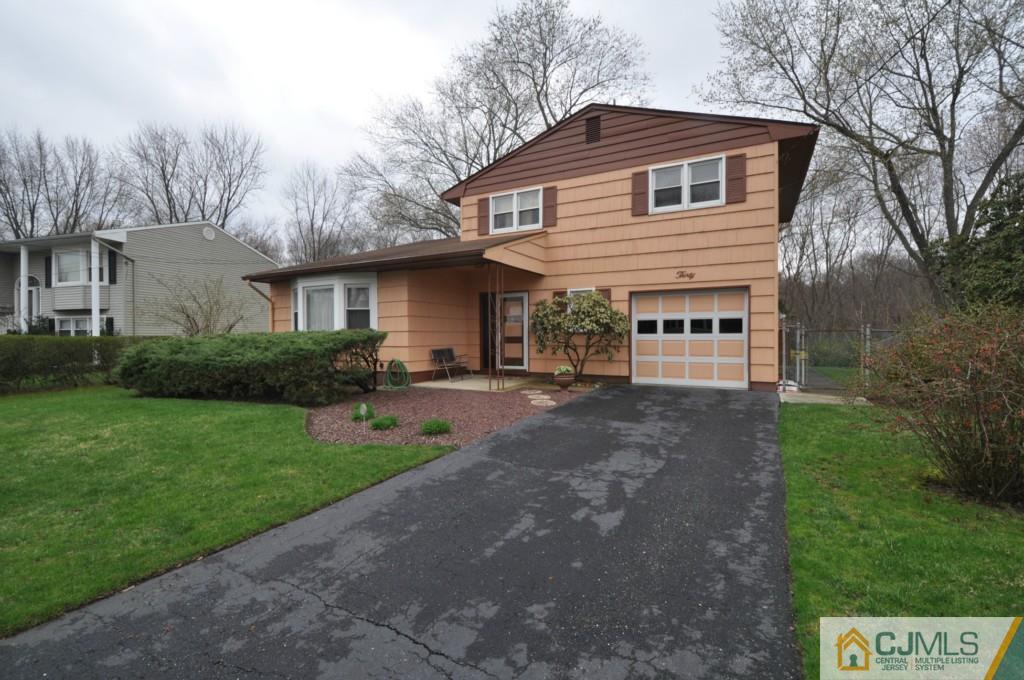 30 Dumas Road Old Bridge, NJ 08857 - Photo 2 of 8 a front view of a house with a yard and outdoor seating