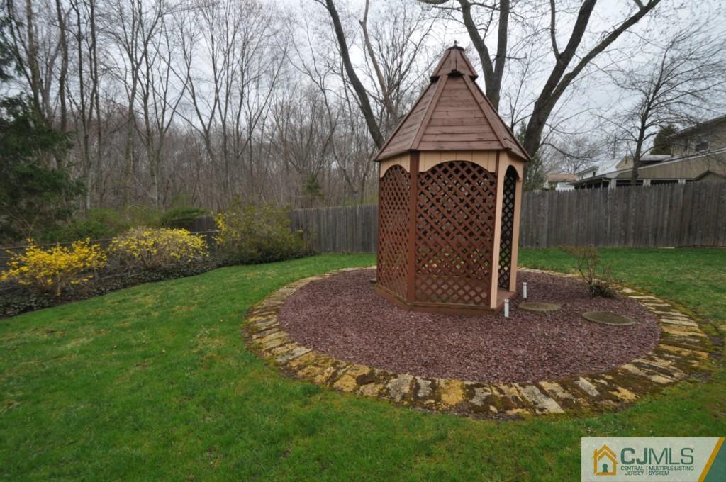 30 Dumas Road Old Bridge, NJ 08857 - Photo 8 of 8 a backyard of a house with lots of green space