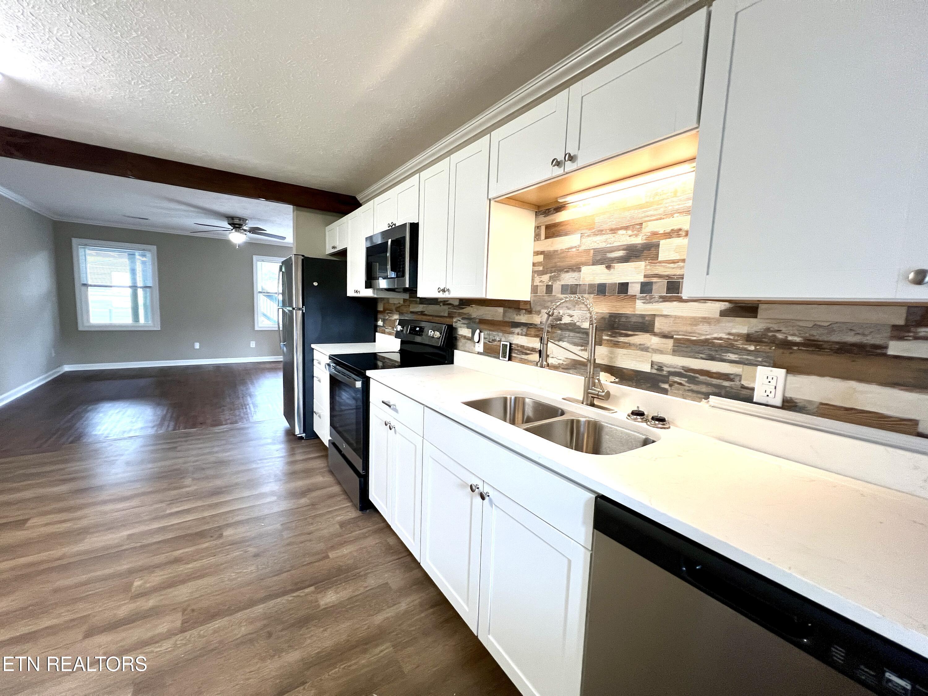 3769 Wears Valley Road, Unit 1 Sevierville, TN 37862 - Photo 4 of 24 20251007_180745210_iOS