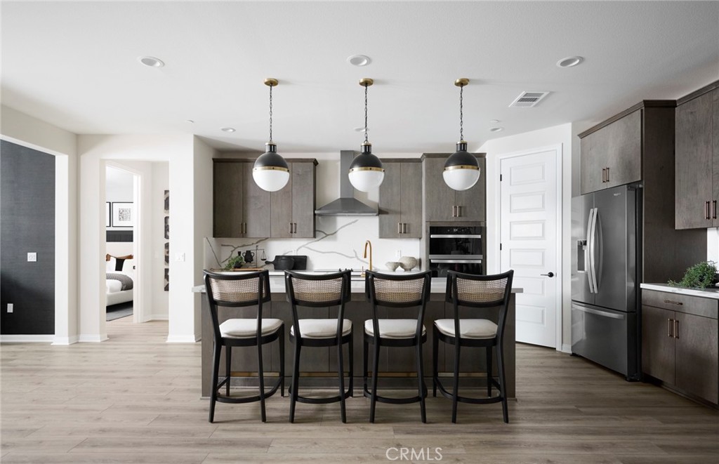 1564 Knott Court Perris, CA 92571 - Photo 2 of 9 Photos uploaded are of the model representing the floor plan and are to demonstrate furniture layout. Furniture pictured is for demonstration only and not included with purchase.