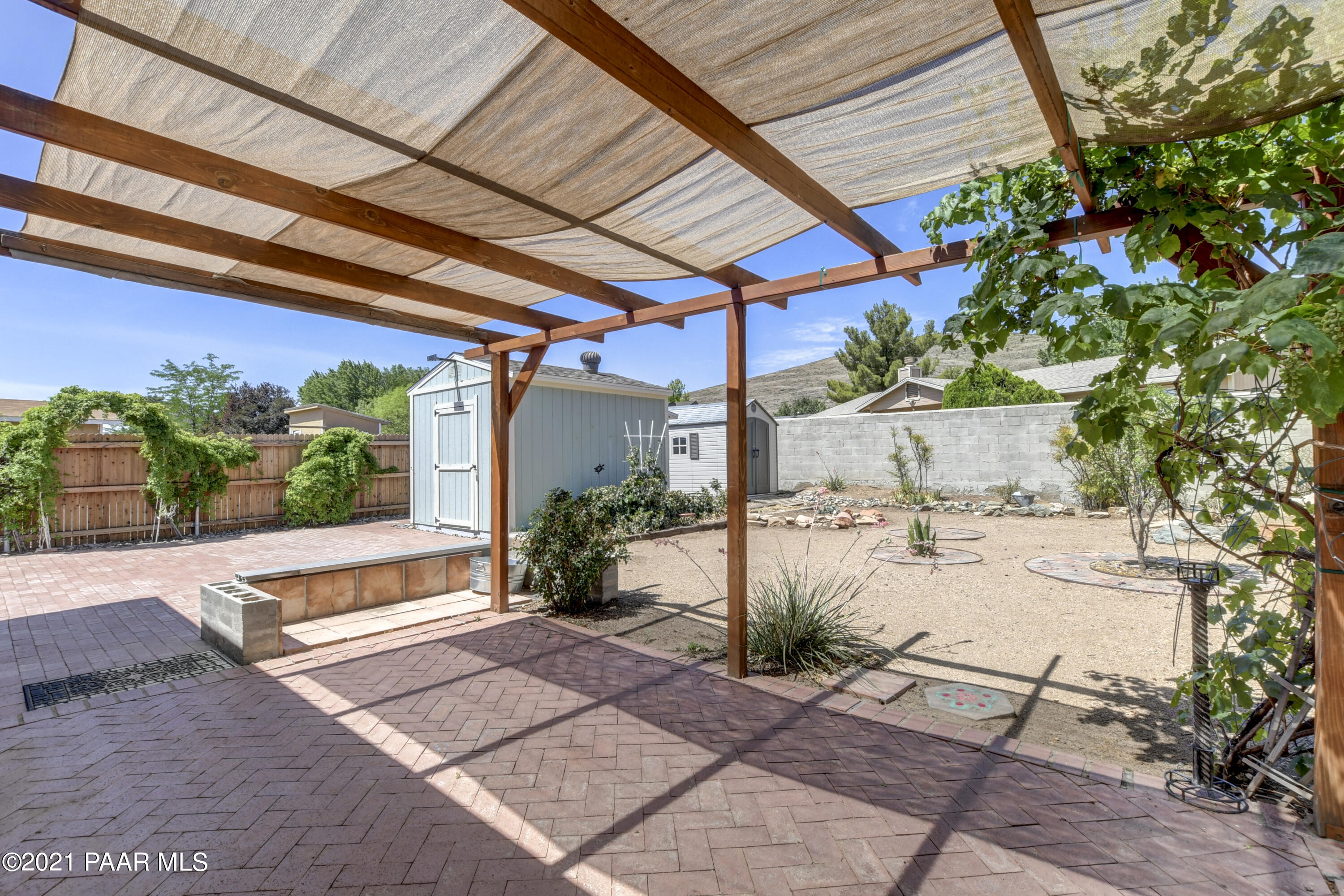 3420 North Tower Road Prescott Valley, AZ 86314 - Photo 23 of 30 023_Beautifully Landscaped Backyard