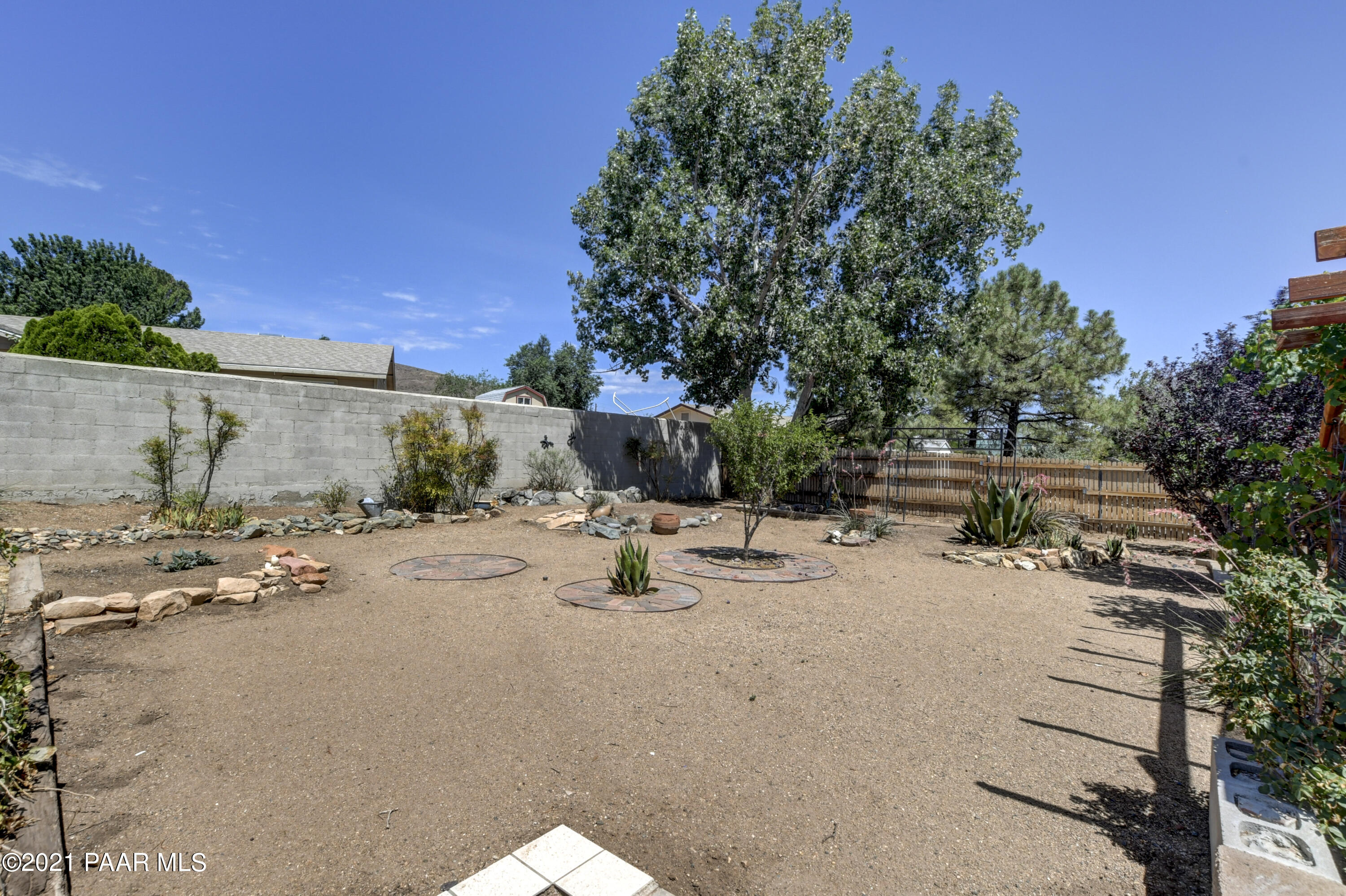 3420 North Tower Road Prescott Valley, AZ 86314 - Photo 25 of 30 025_Backyard w Mature Landscaping