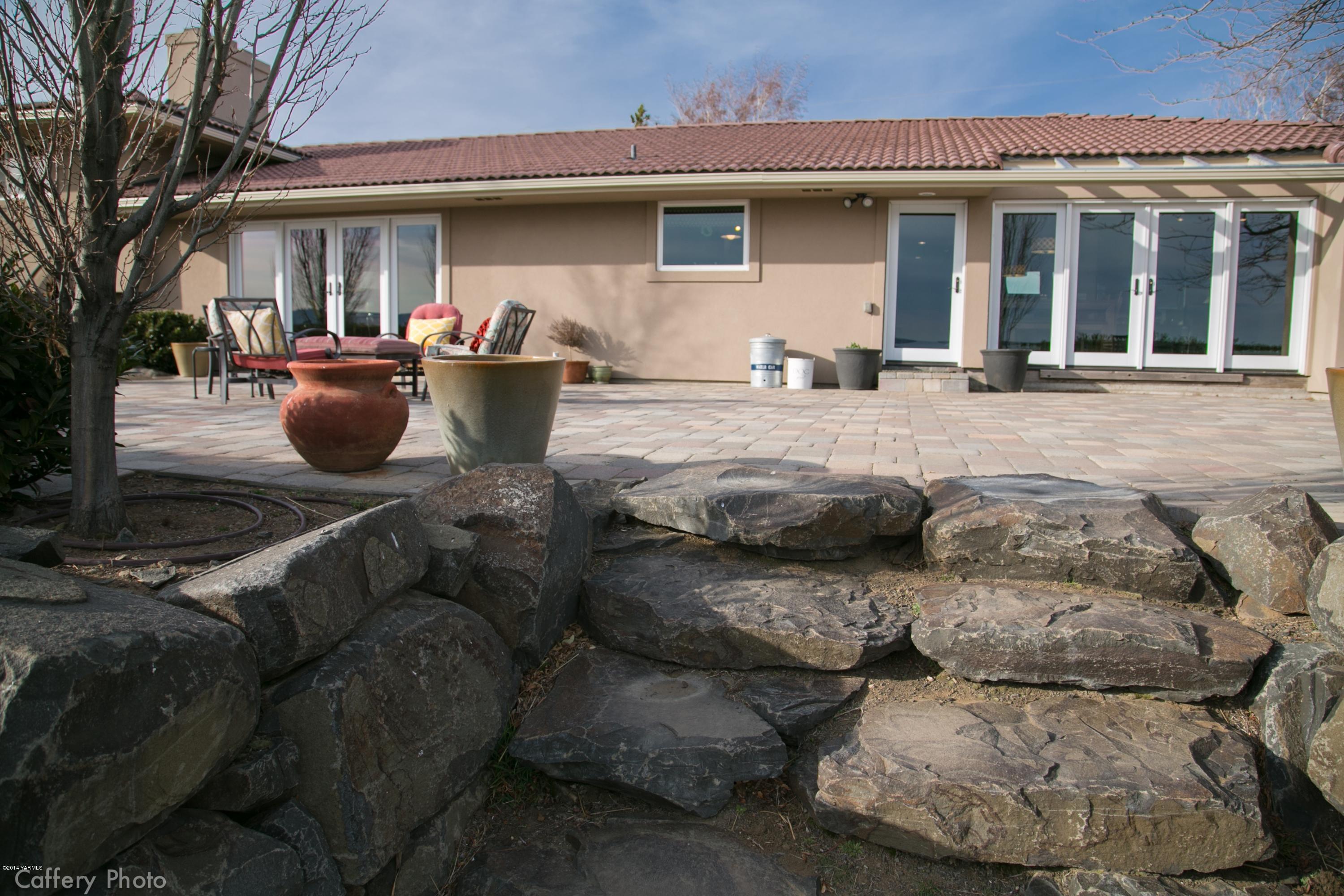 1102 Hillman Road Yakima, WA 98908 - Photo 20 of 49 a front view of a house with outdoor seating