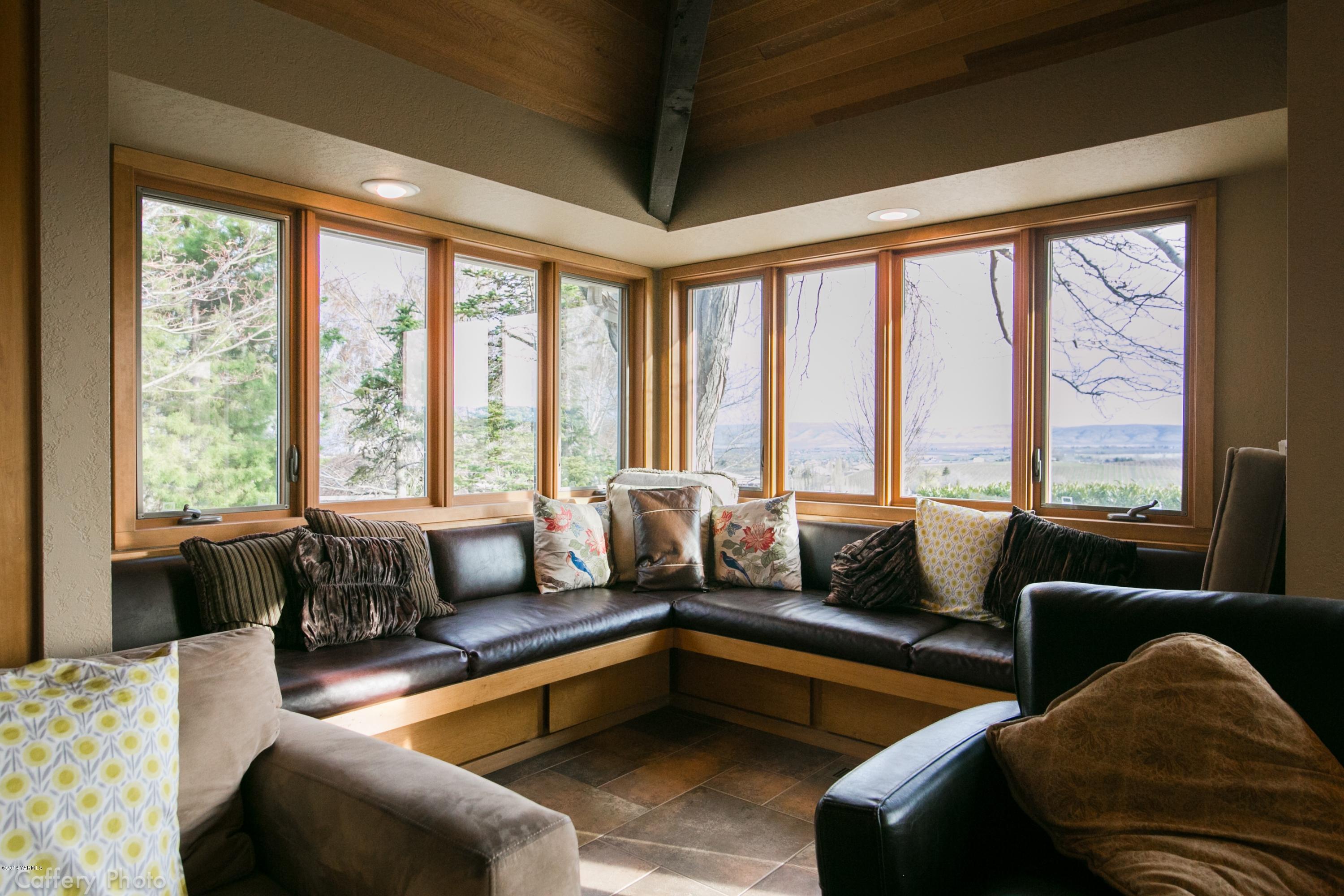 1102 Hillman Road Yakima, WA 98908 - Photo 33 of 49 a living room with furniture and floor to ceiling windows
