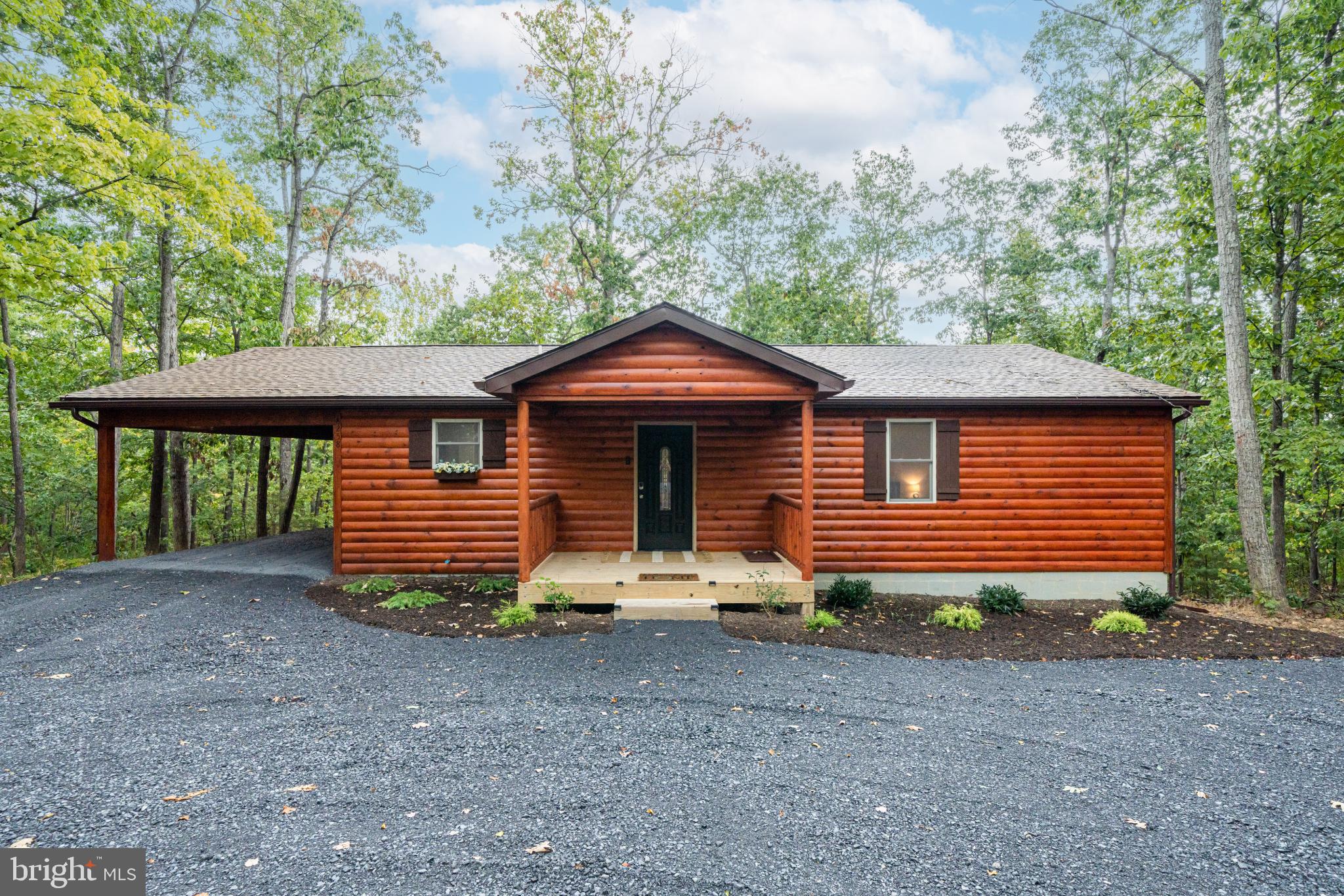 8258 Supinlick Ridge Road Basye, VA 22842 - Photo 59 of 65 Charming cabin nestled in serene woods.