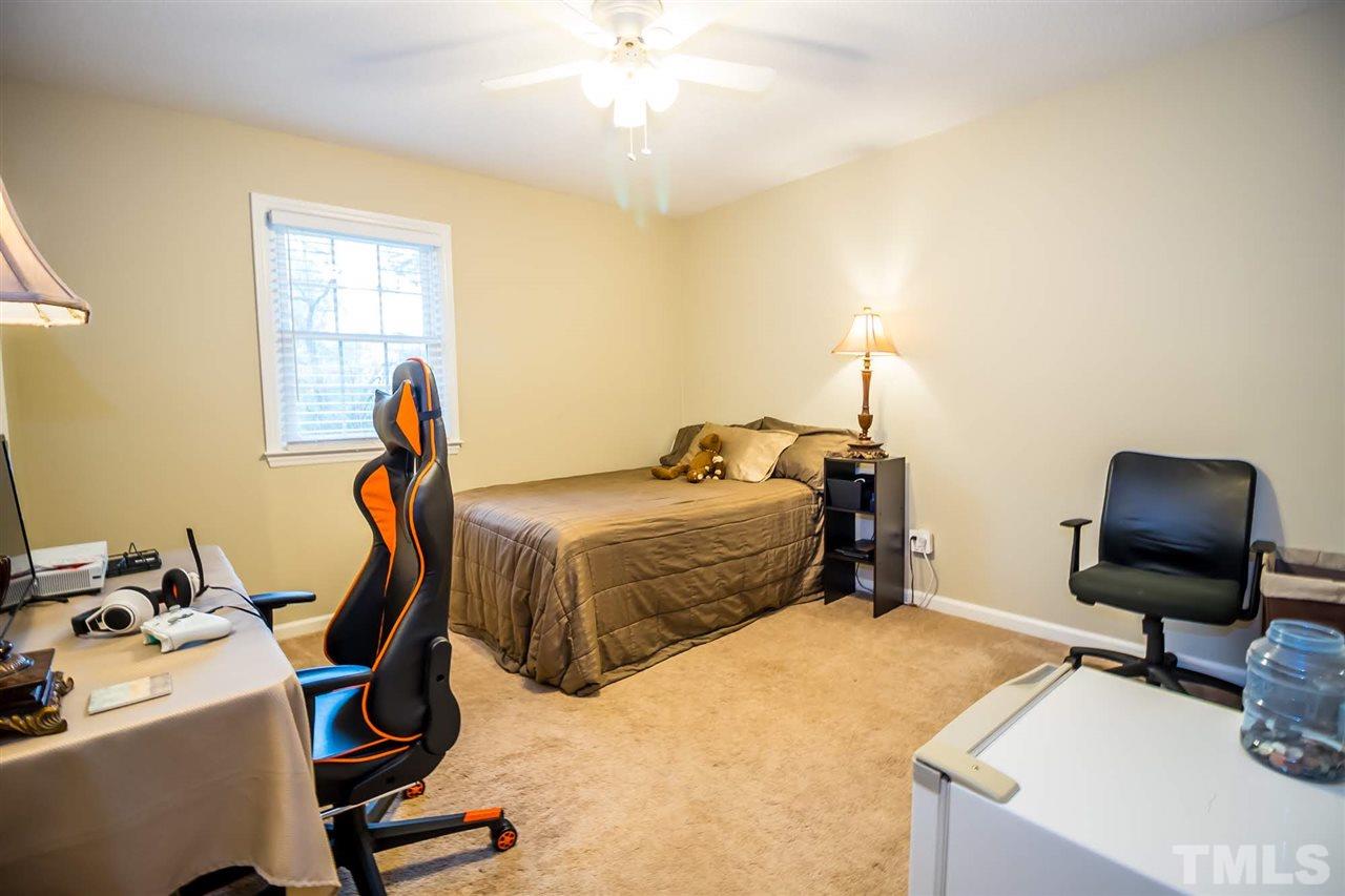 2009 Messer Road Raleigh, NC 27603 - Photo 17 of 30 a bedroom with bed and window