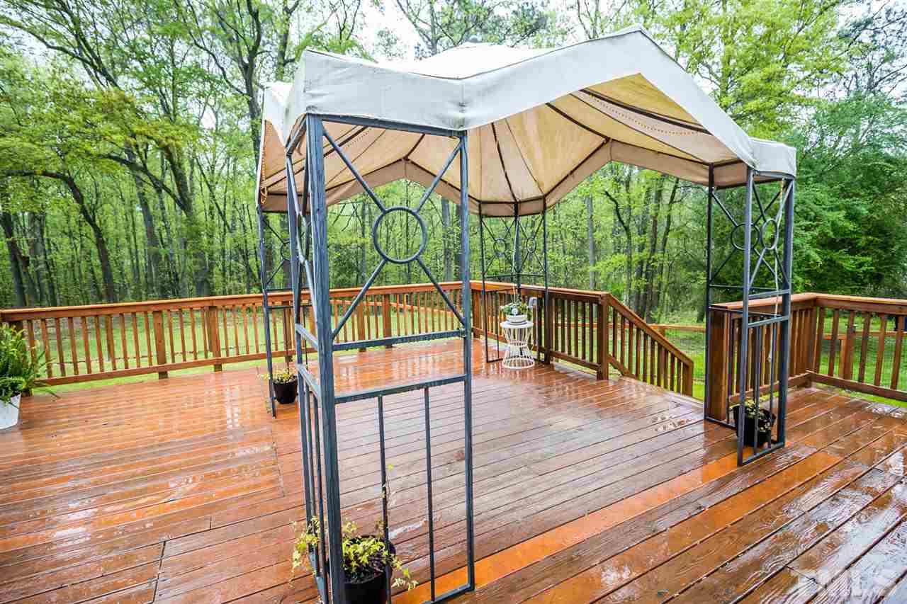 2009 Messer Road Raleigh, NC 27603 - Photo 24 of 30 a view of a balcony with wooden floor