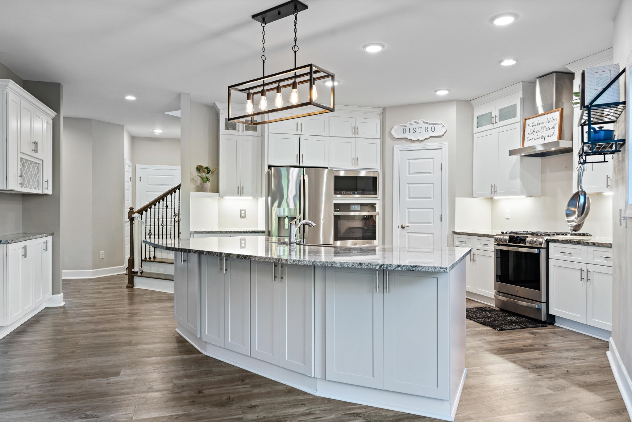 123 Chesapeake Court Lebanon, TN 37087 - Photo 15 of 62 a kitchen with stainless steel appliances granite countertop a refrigerator a stove and a wooden floors