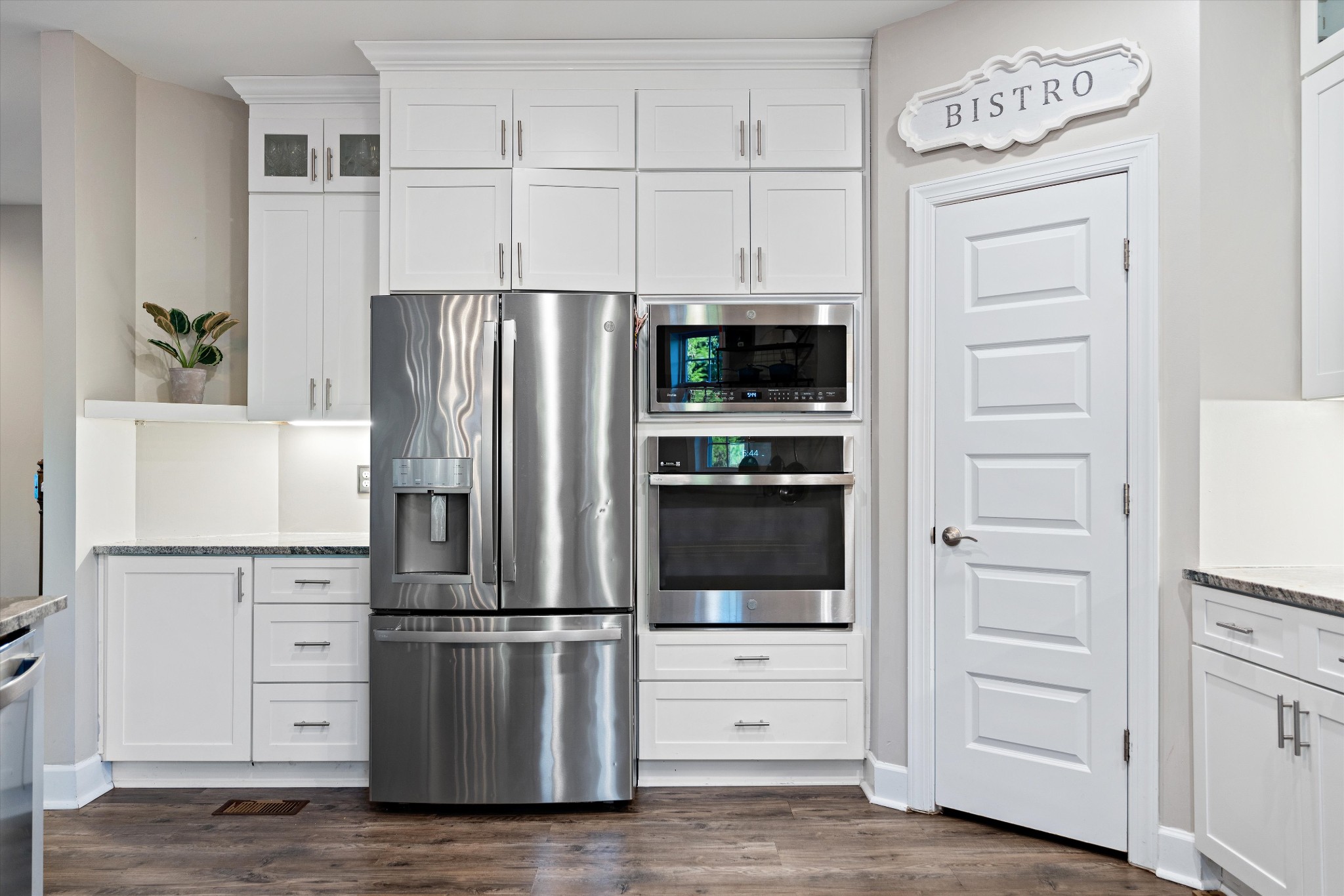 123 Chesapeake Court Lebanon, TN 37087 - Photo 16 of 62 a kitchen with refrigerator a microwave and cabinets
