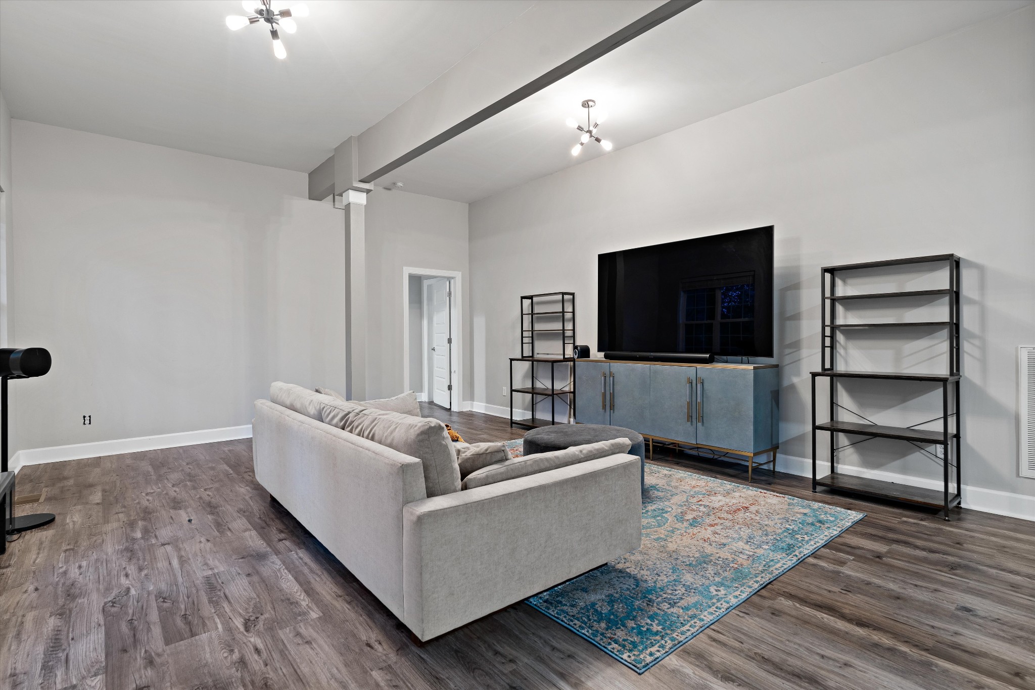 123 Chesapeake Court Lebanon, TN 37087 - Photo 40 of 62 a living room with furniture and a flat screen tv