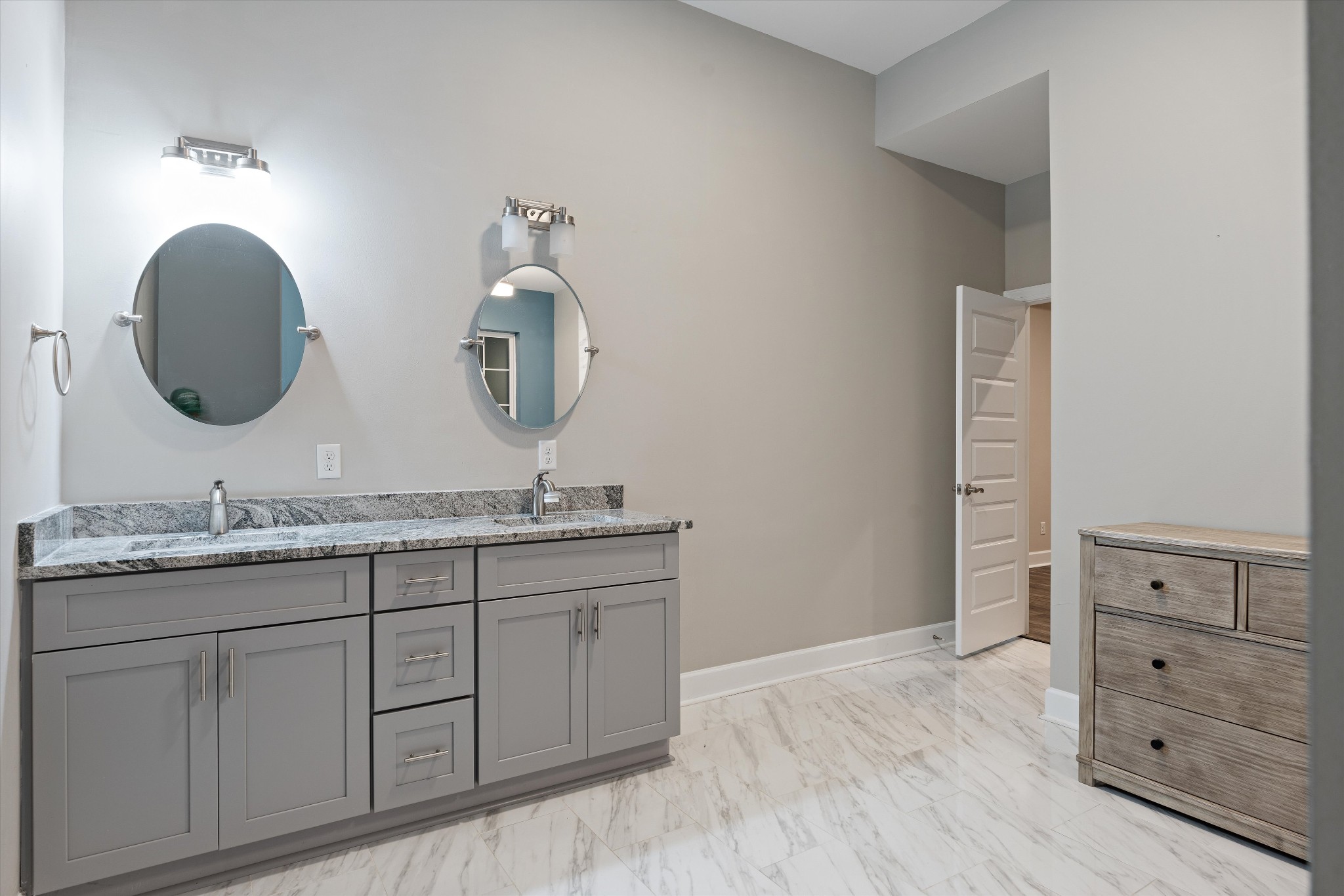 123 Chesapeake Court Lebanon, TN 37087 - Photo 43 of 62 a bathroom with a granite countertop sink mirror and vanity
