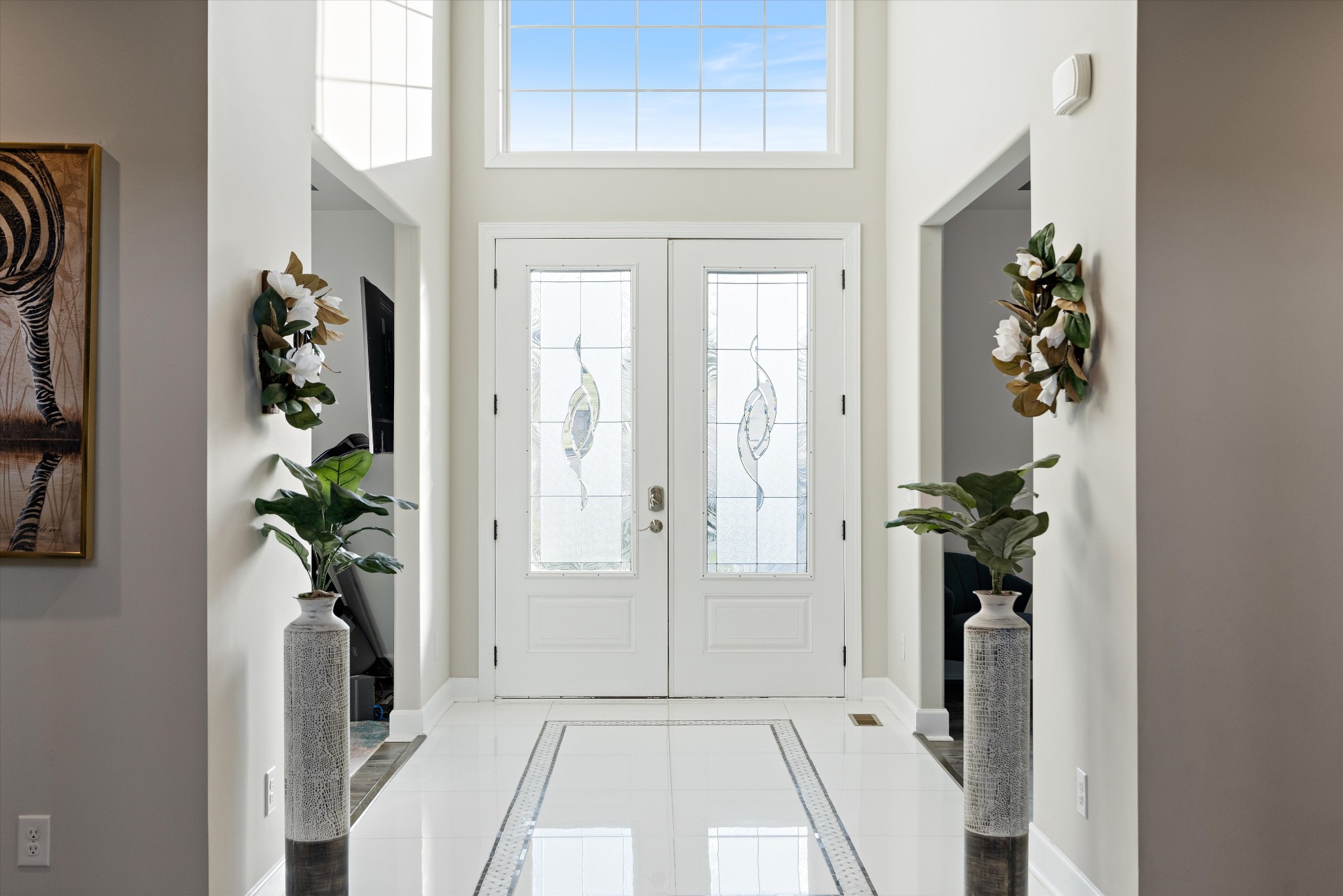 123 Chesapeake Court Lebanon, TN 37087 - Photo 8 of 62 a view of a hallway with wooden floor and a living room