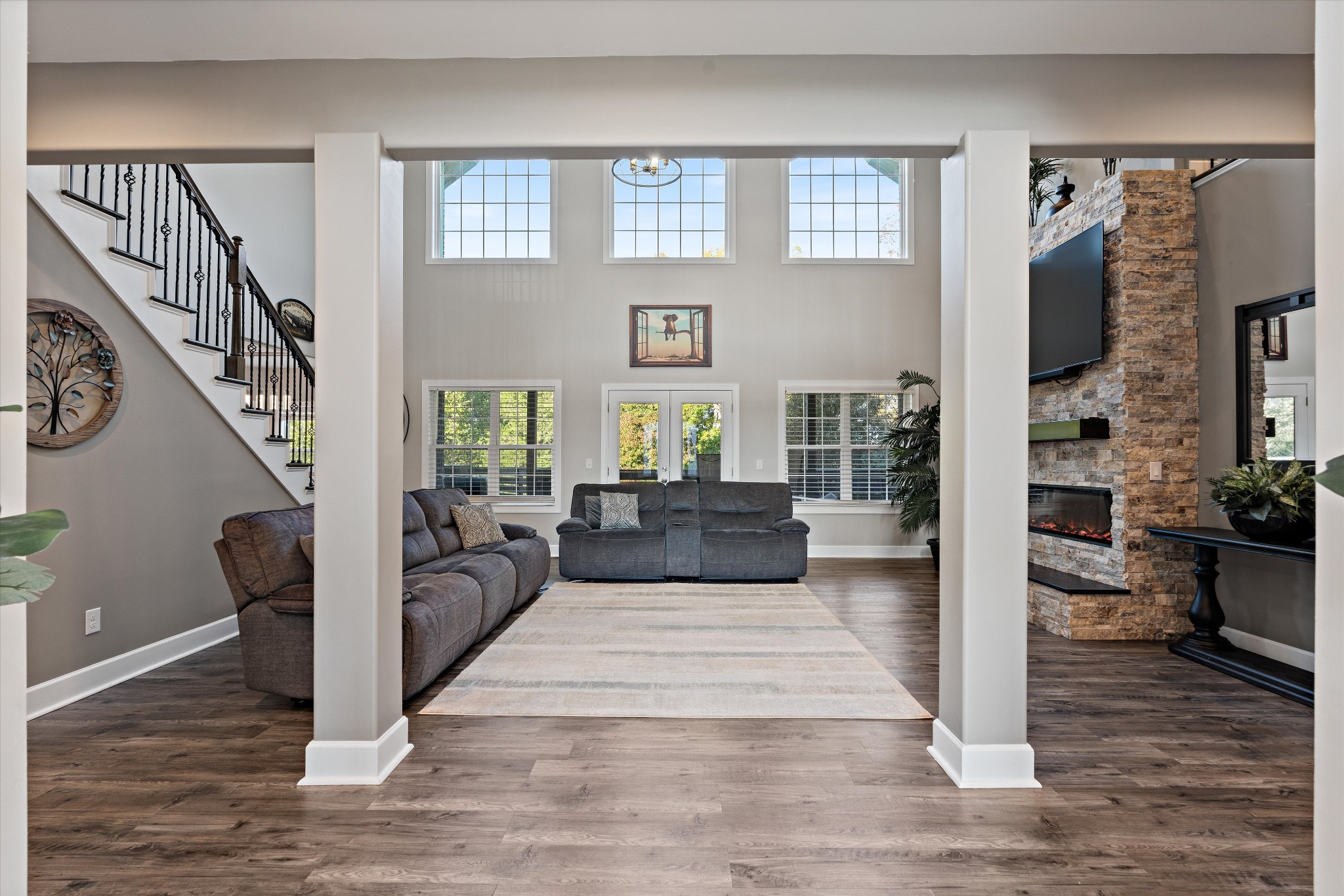 123 Chesapeake Court Lebanon, TN 37087 - Photo 9 of 62 a living room with furniture floor to ceiling window and wooden floor