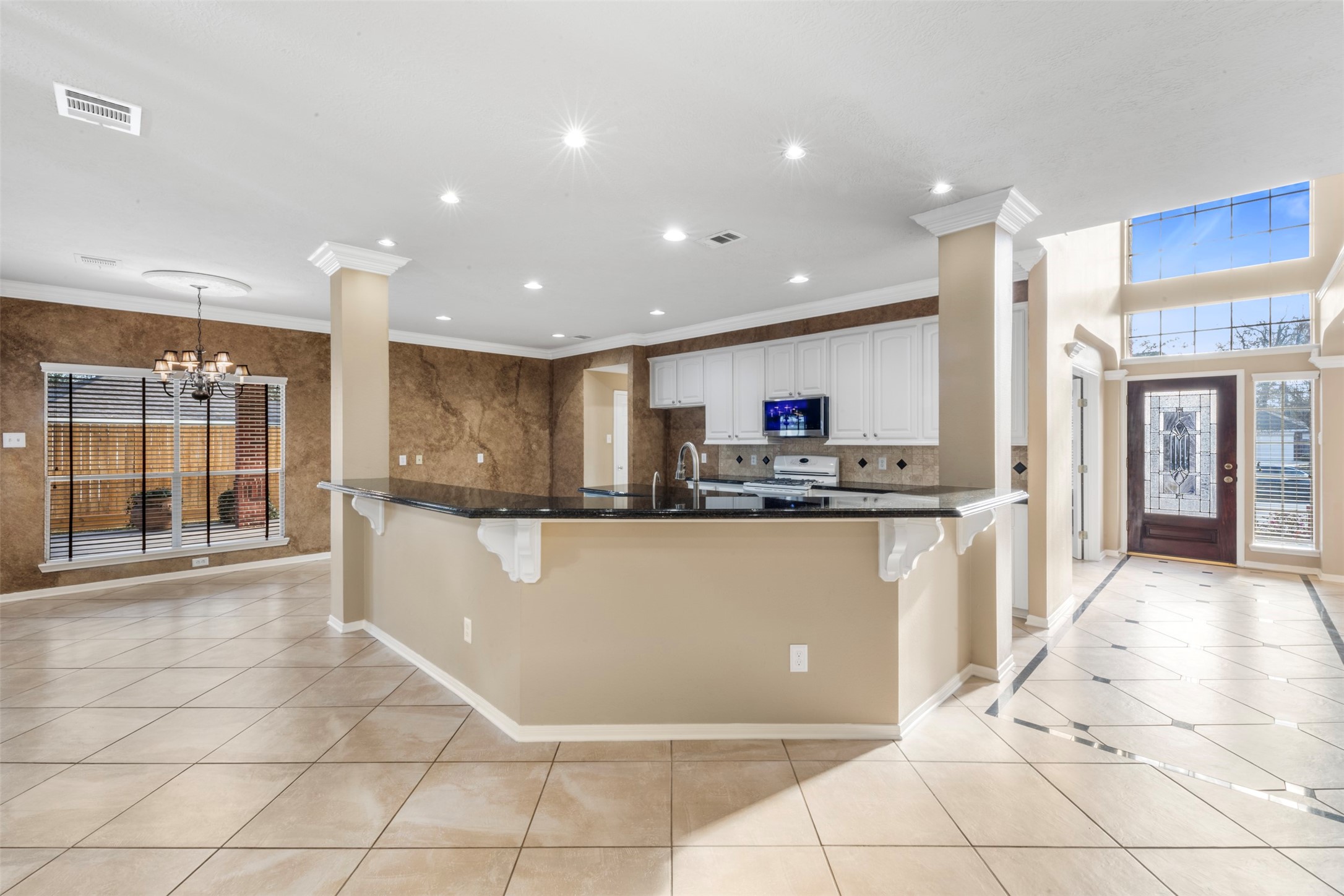 2406 Spanish Oak Hill Court Spring, TX 77388 - Photo 1 of 44 a view of a kitchen with kitchen island granite countertop lots of counter top space